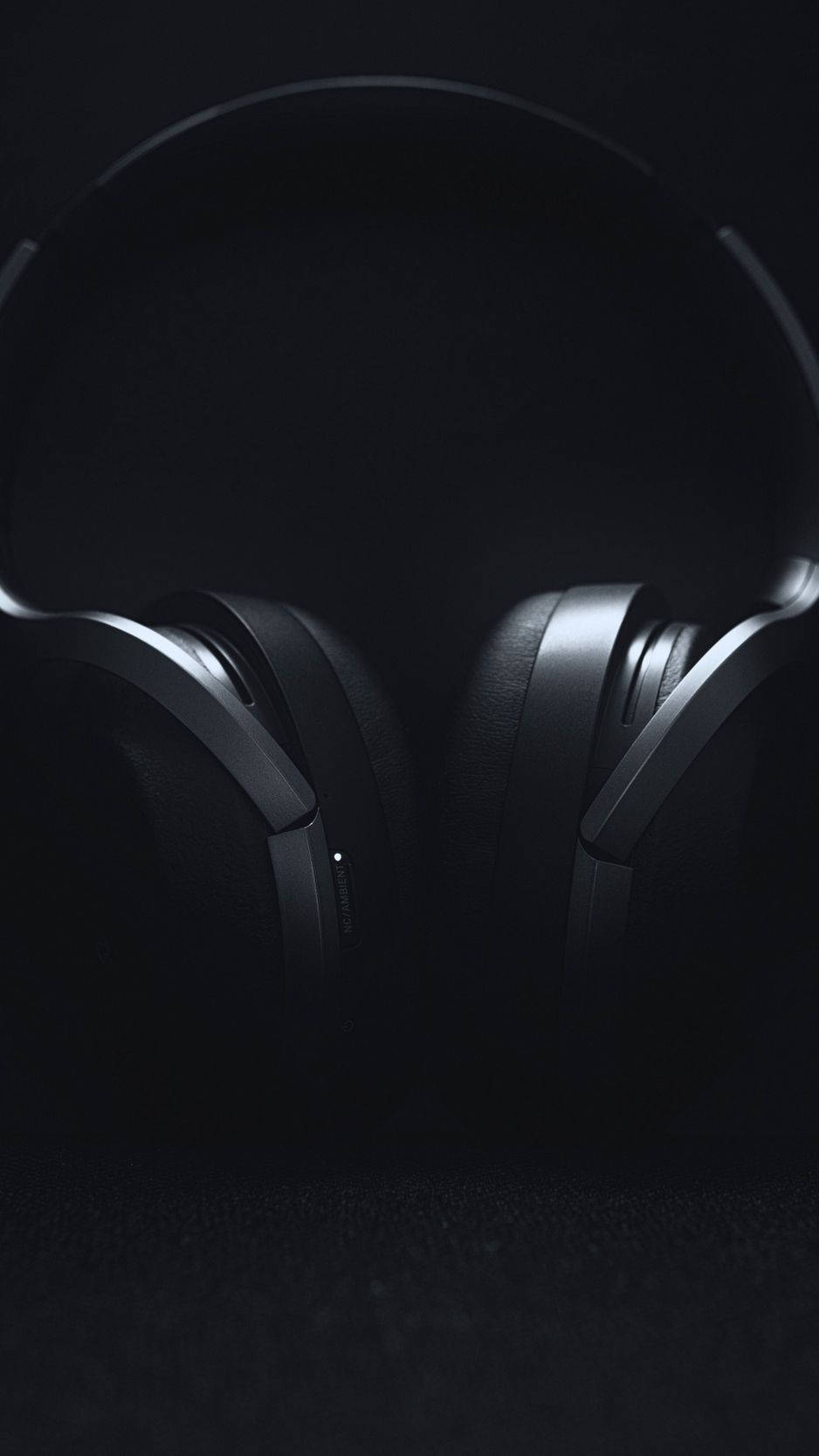 Headphones On Black Iphone 6 Plus Background