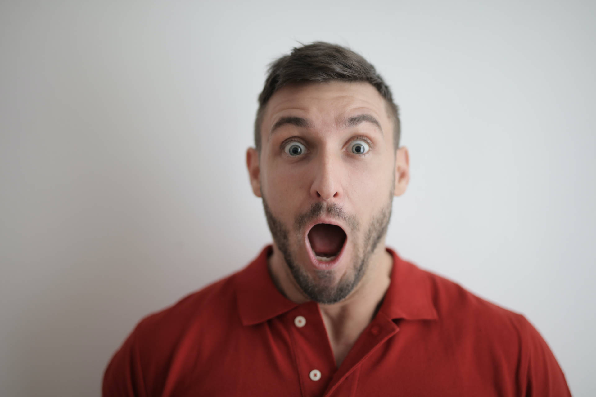 Headshot Of A Man With Shocked Face Background