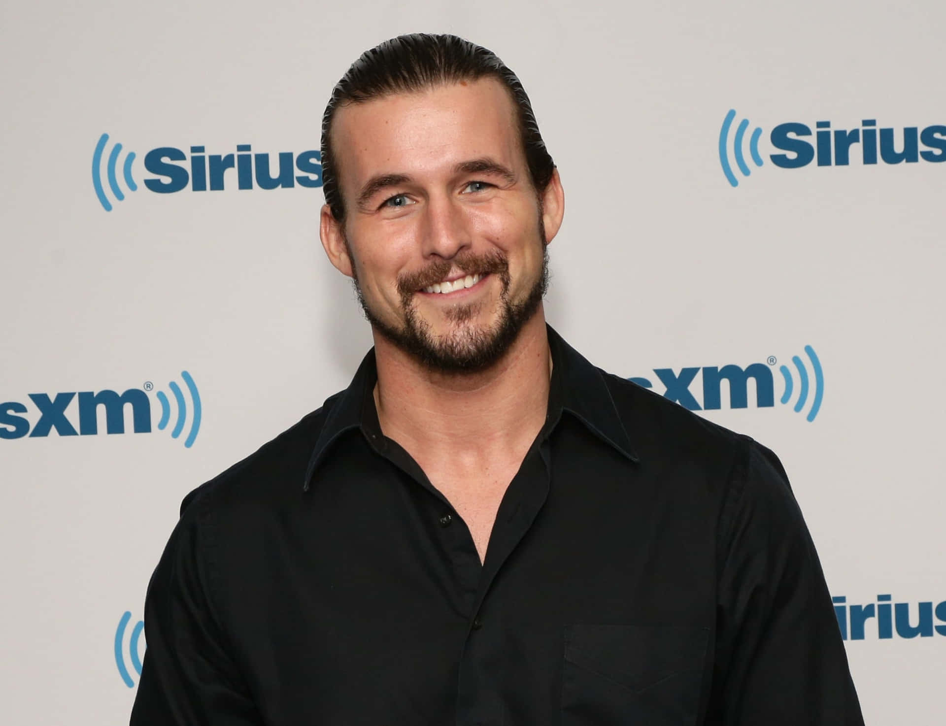 Headshot Photo Of Adam Cole Background