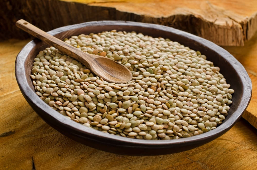 Healthy Organic Lentils In A Rustic Wooden Bowl Background