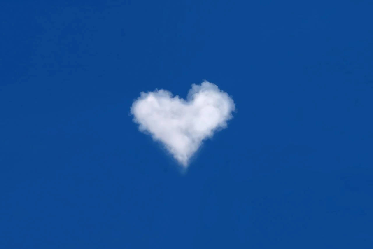 Heart Cloud On Blue Sky Background