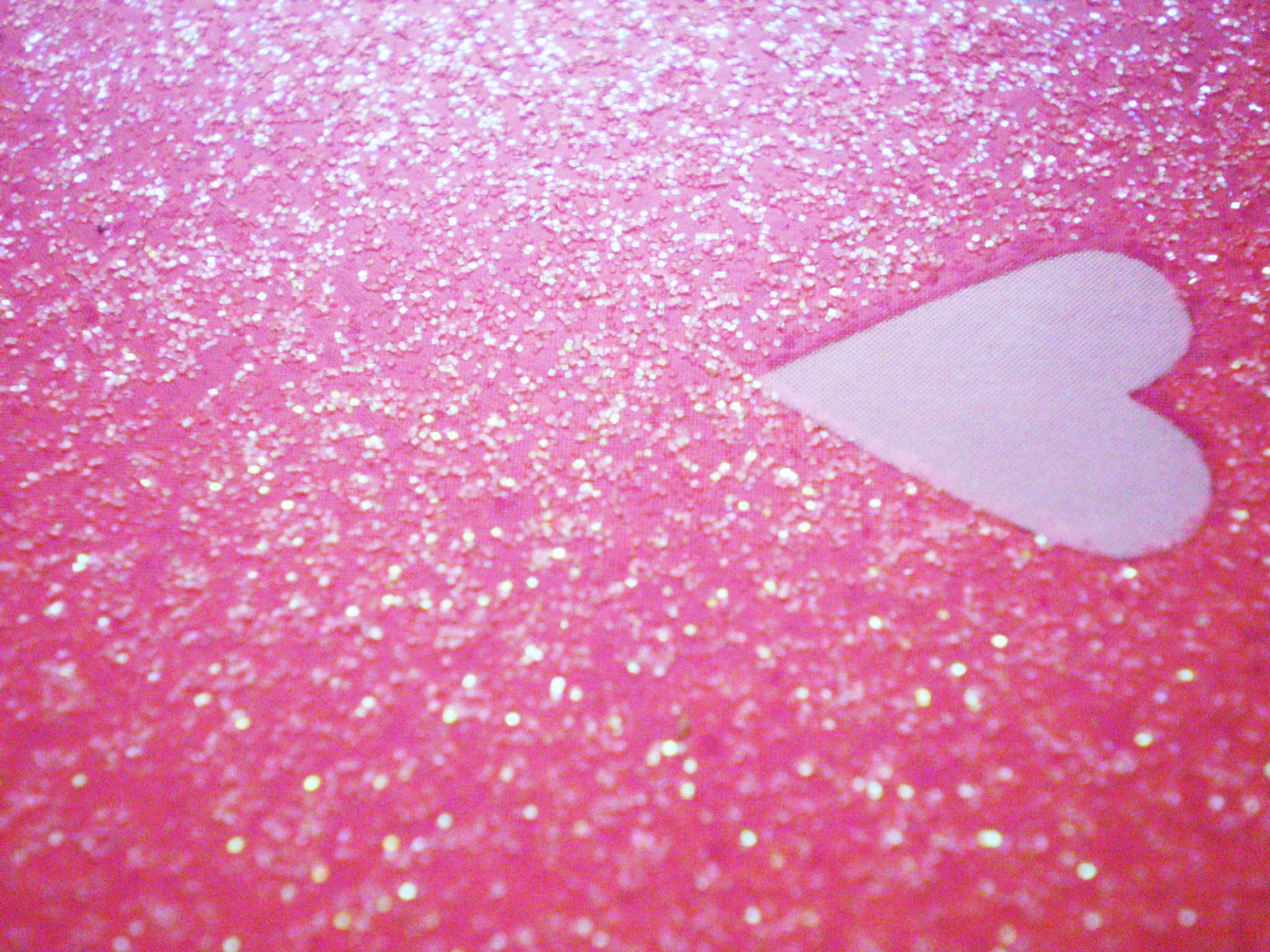 Heart In Pink Sparkles Background