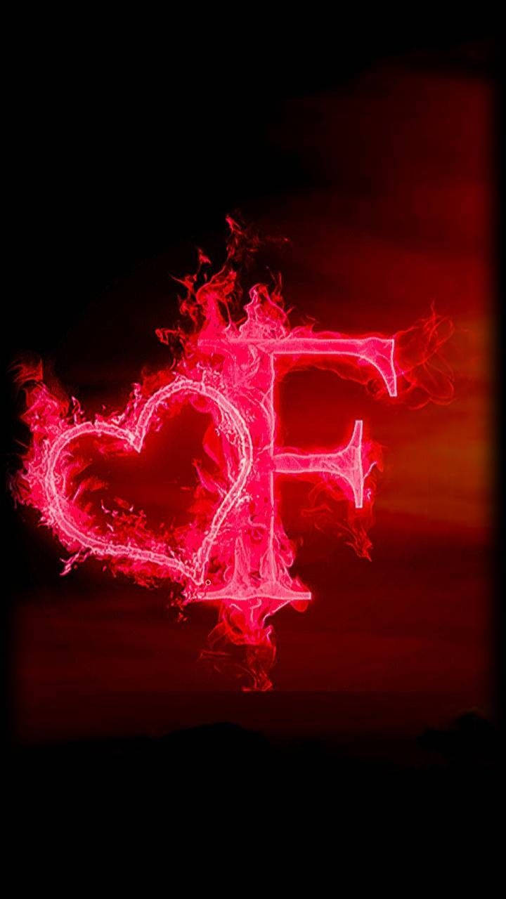 Heart Letter F On Pink Fire Background