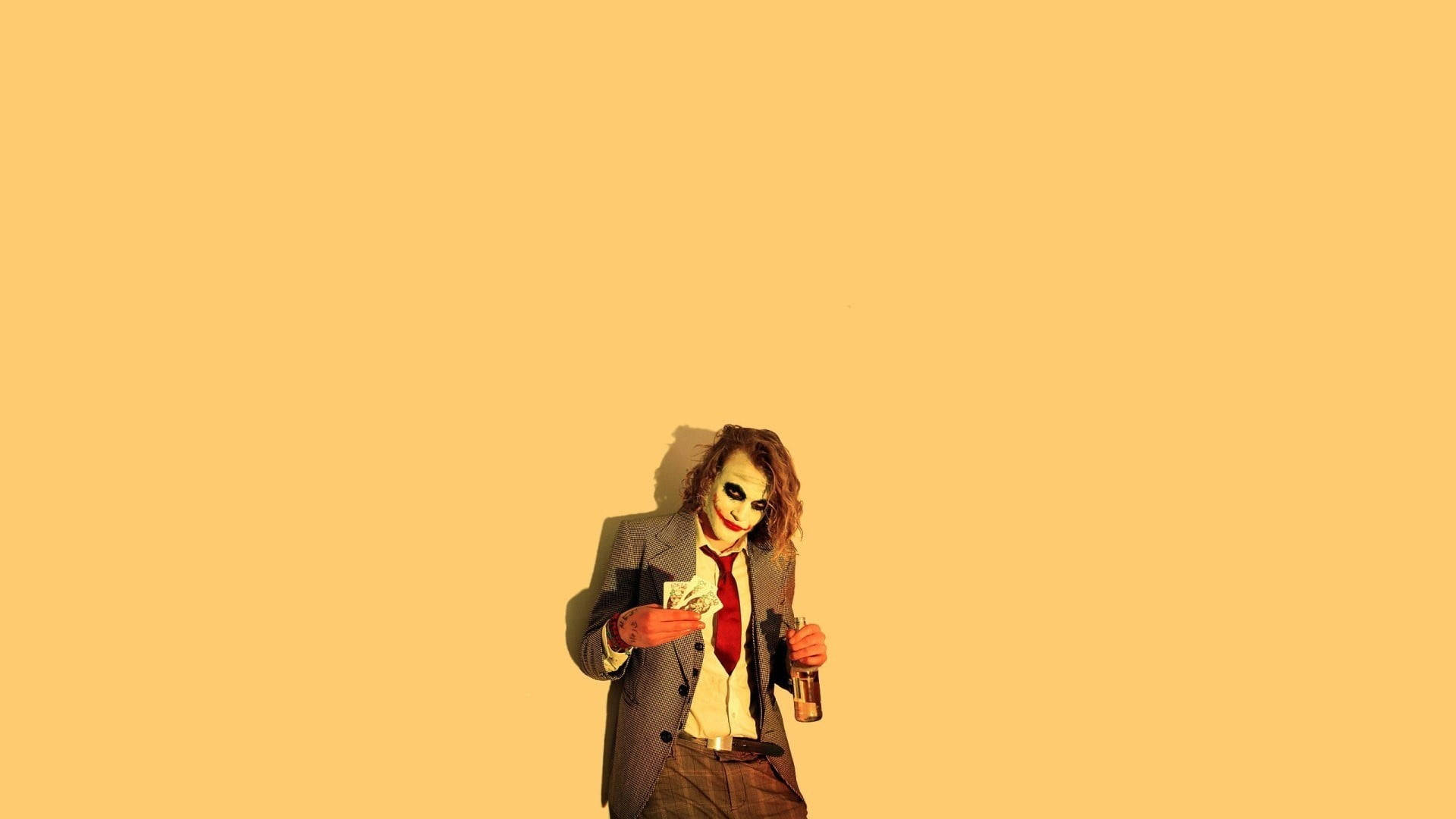 Heath Ledger Joker Art Yellow Background Background