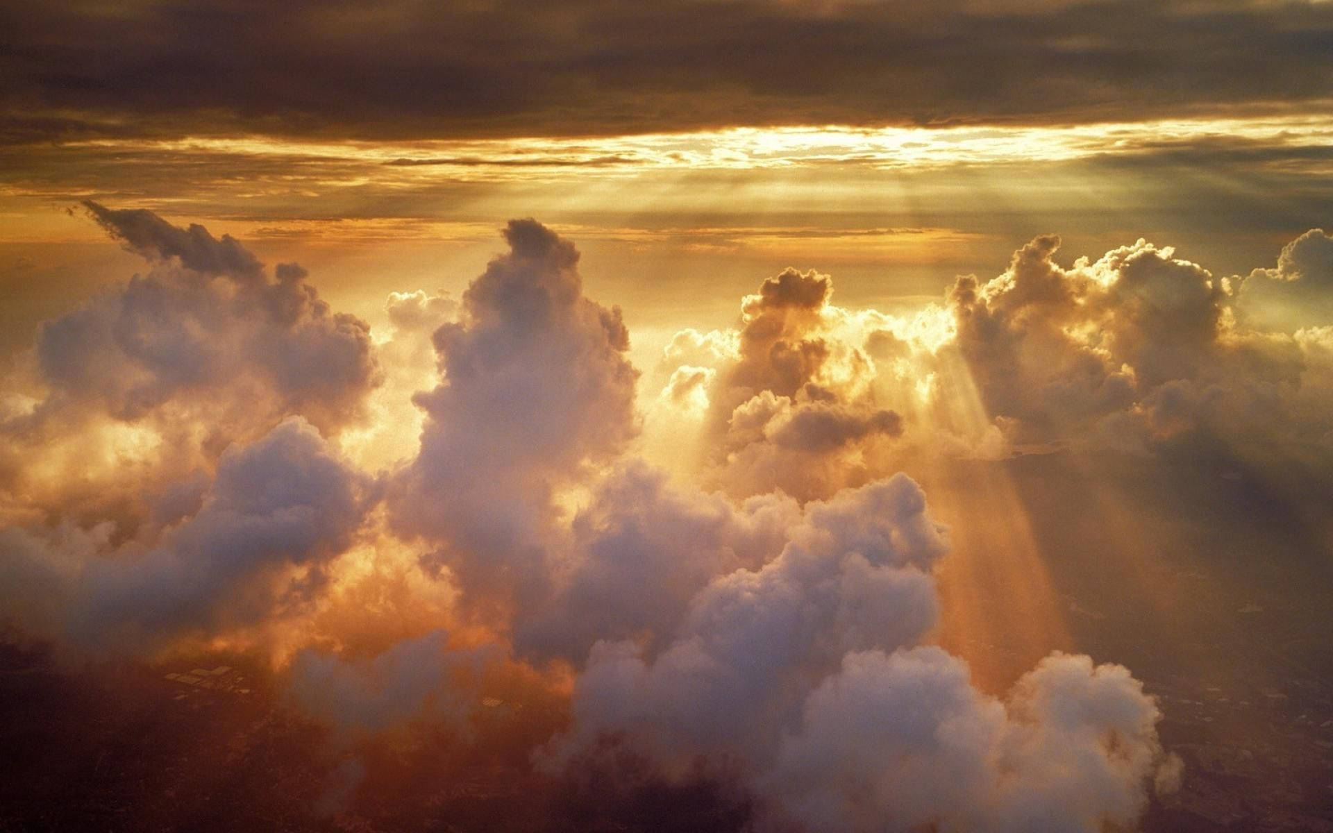 “heavenly Clouds Dazzle With Colorful Light” Background