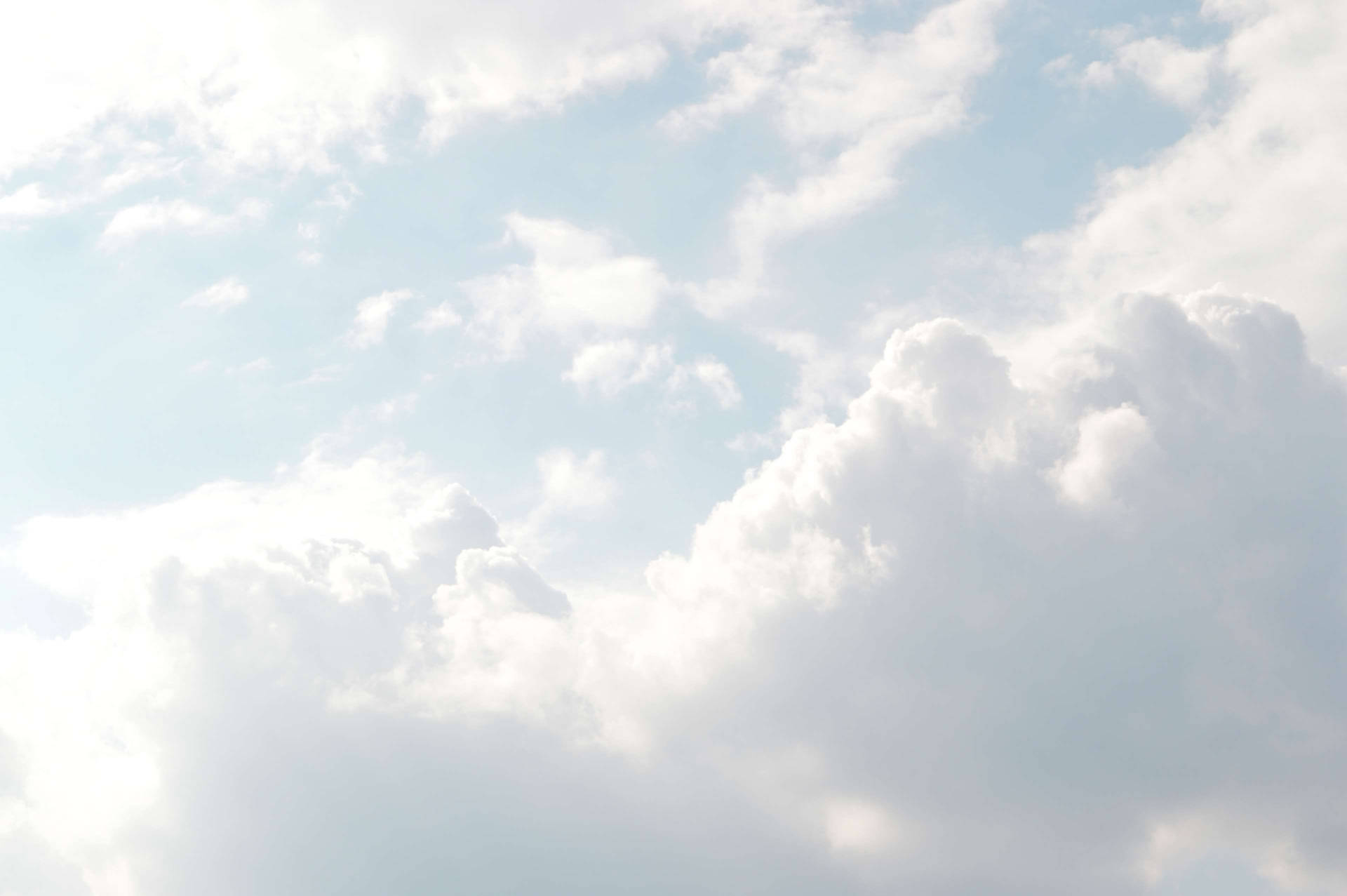 “heavenly Clouds Stretching Across The Sky” Background