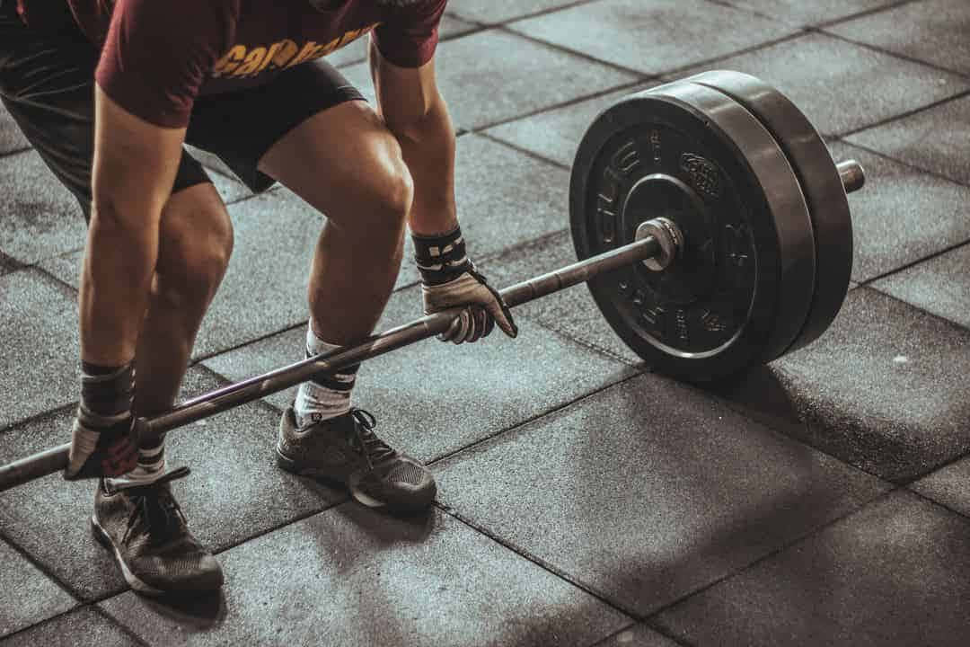 Heavy Barbell To Improve Unilateral Upper Body Muscles Background