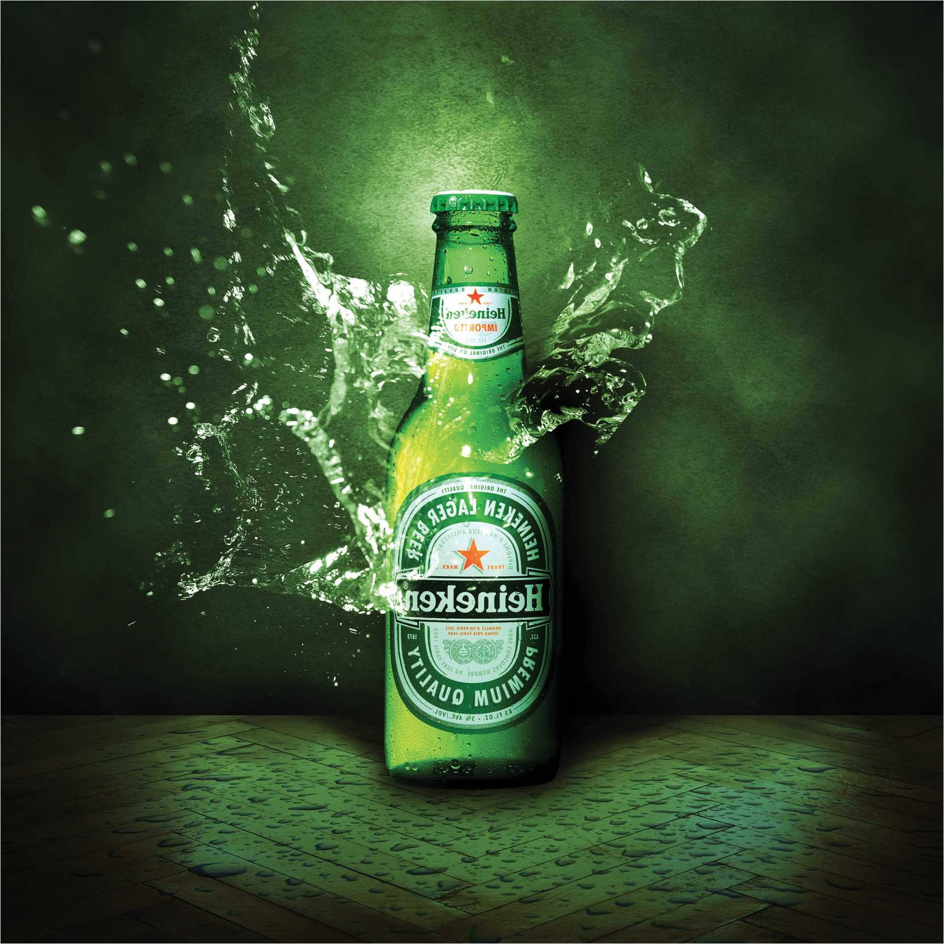 Heineken Lager Beer Bottle With Water Splash Background