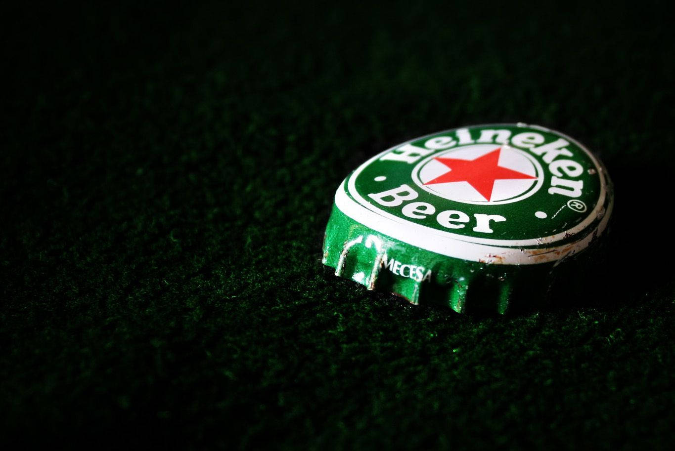 Heineken Lager Beer Dented Bottle Cap Background