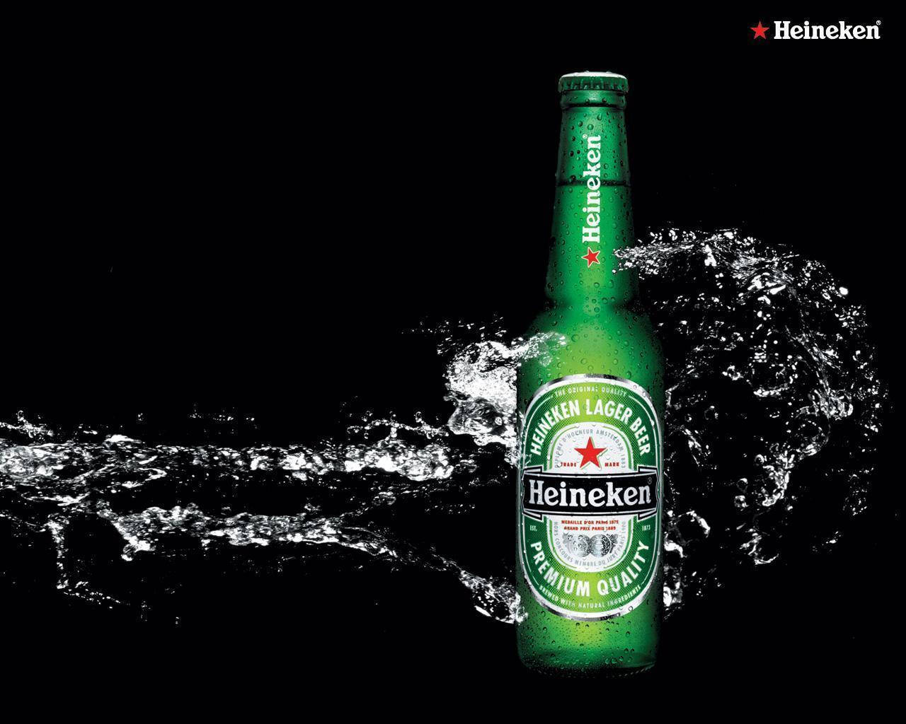 Heineken Lager Beer With Water Splashing Effect Background