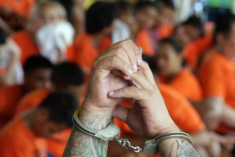 Heinous Handcuffed Person Background