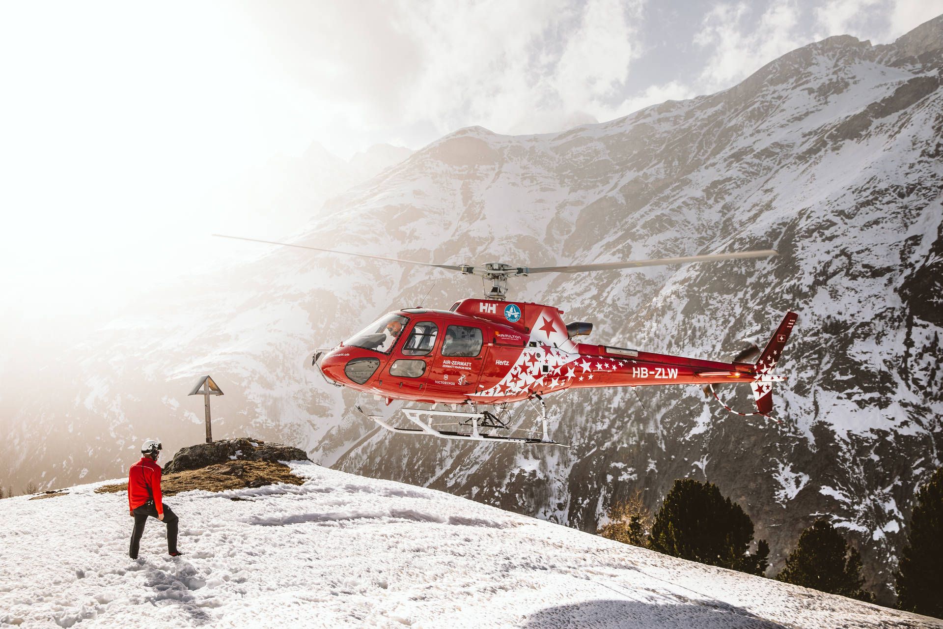 Helicopter On Snowy Mountain Background