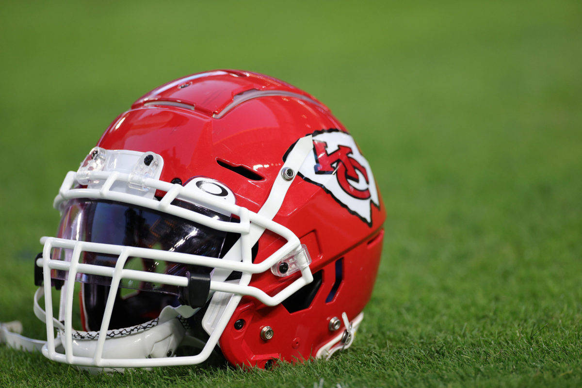 Helmet With Kansas City Chiefs Logo Background