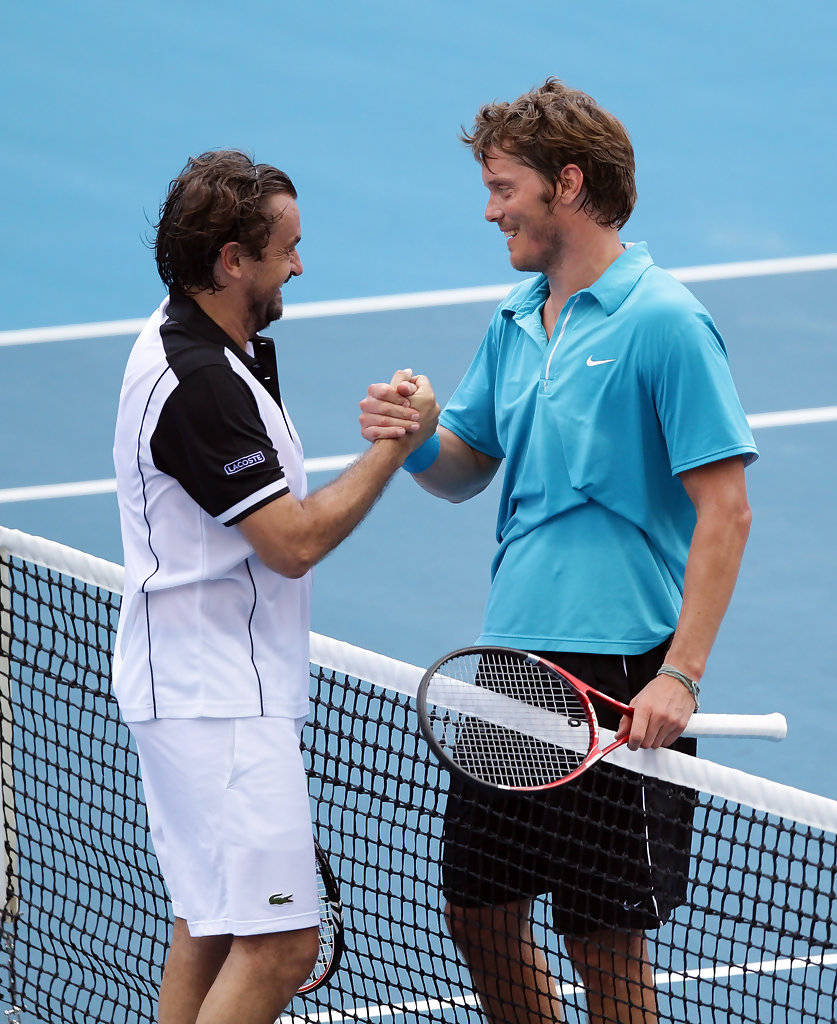 Henri Leconte & Thomas Enqvist Celebratory Handshake Background