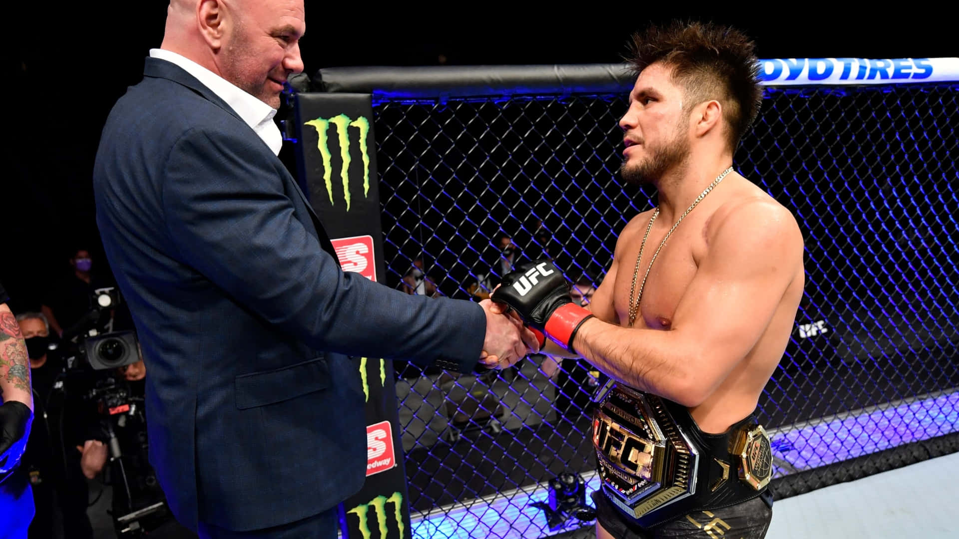 Henry Cejudo Talking With Ufc President Dana White Background