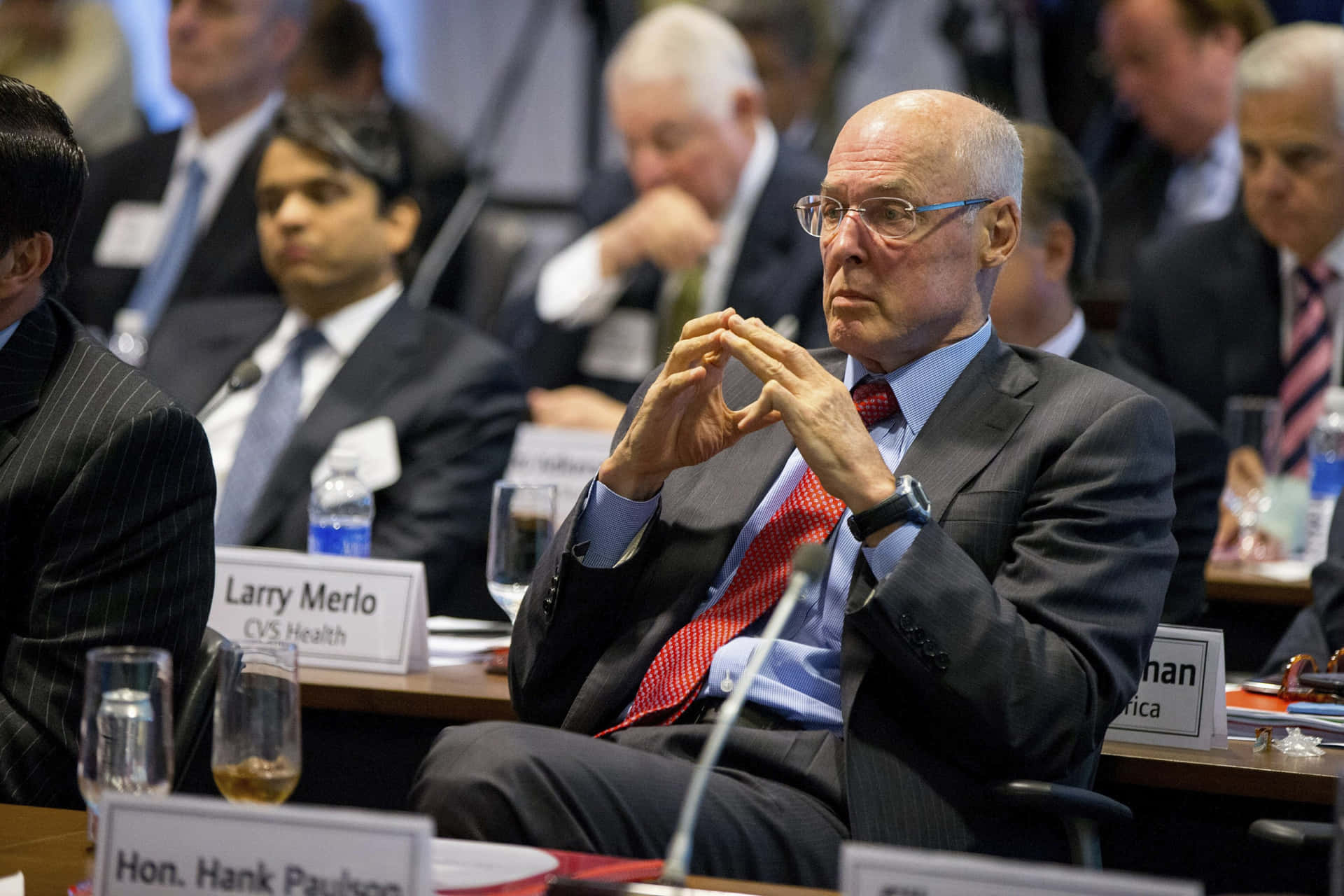 Henry Paulson Sitting In Conference