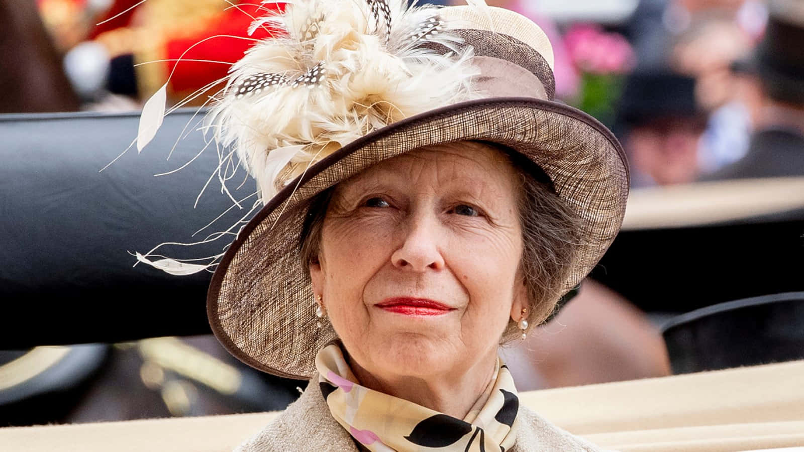 Her Royal Highness Princess Anne At The Annual Ascot Racecourse Background