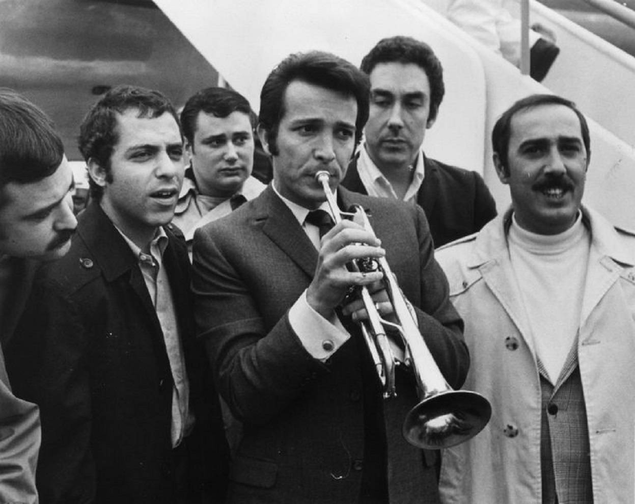 Herb Alpert Alongside The Tijuana Brass Band Members Background