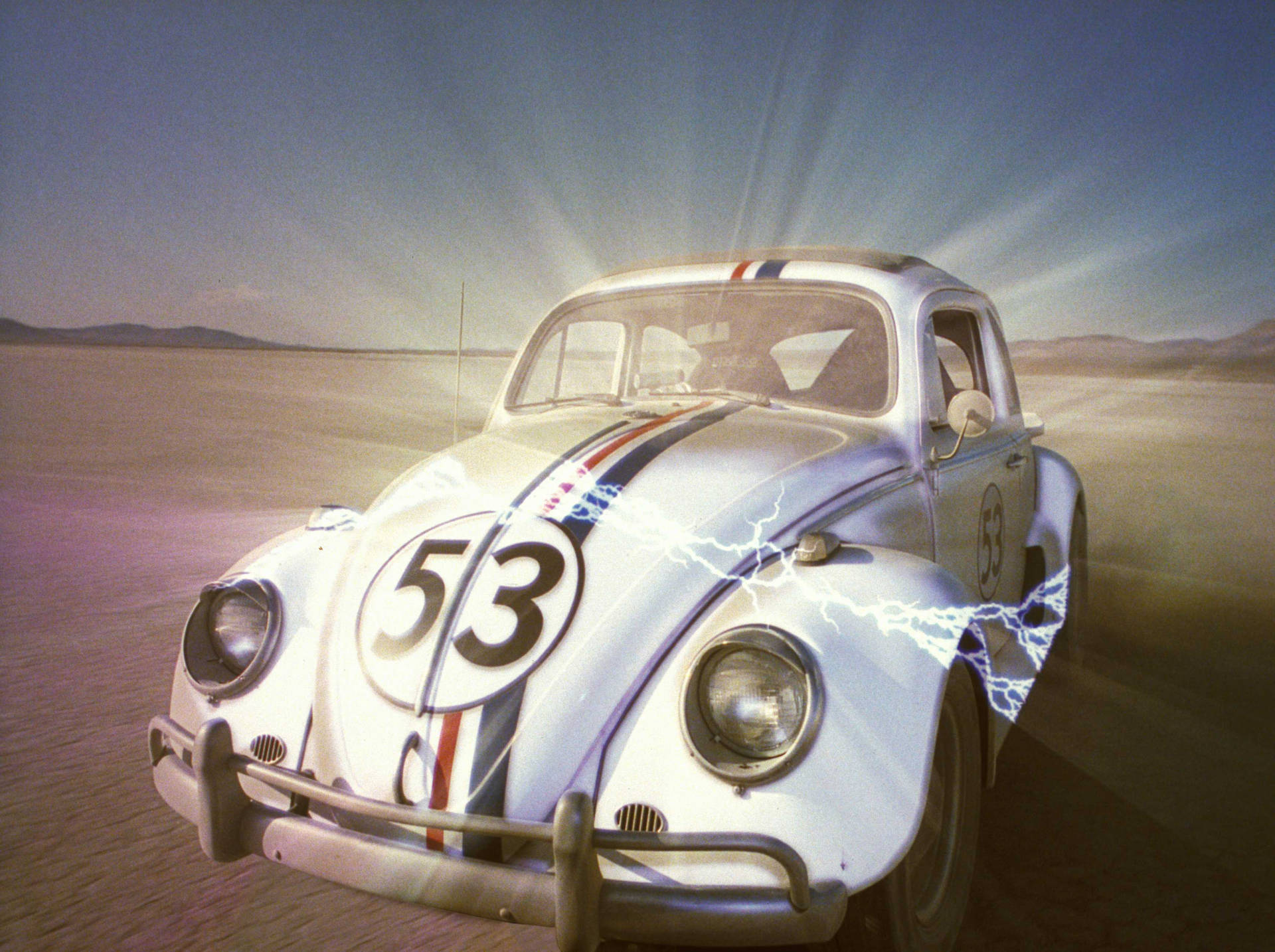 Herbie Fully Loaded Glowing In The Desert Background