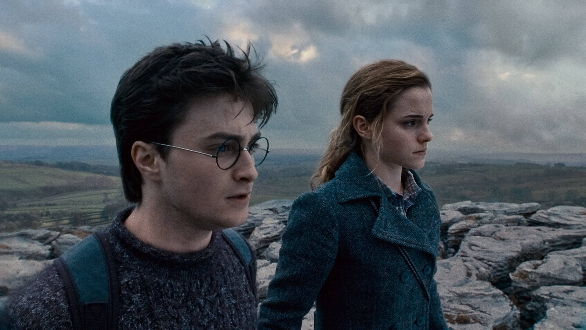 Hermione Granger And Harry Potter Face Off In A Magical Duel. Background