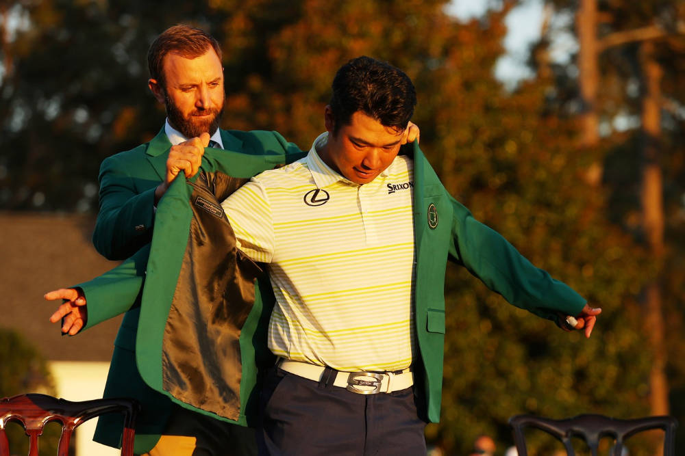 Hideki Matsuyama Donning The Iconic Masters Green Jacket