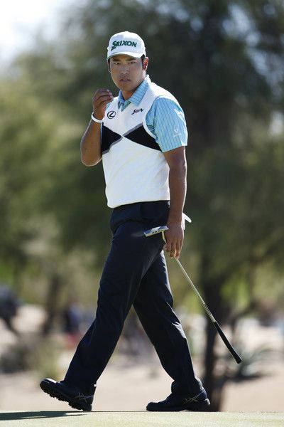 Hideki Matsuyama Examining The Hole Background