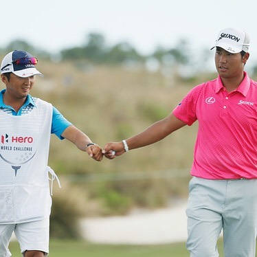 Hideki Matsuyama Fist Bumping Caddie