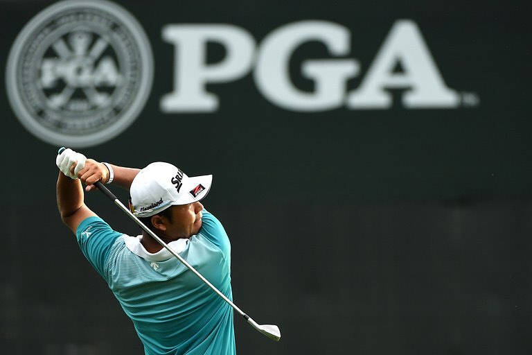 Hideki Matsuyama In Front Of Pga Logo