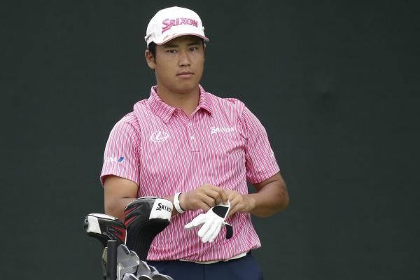 Hideki Matsuyama In Pink Shirt Background