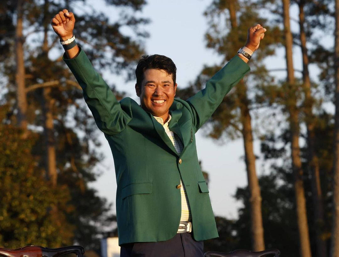 Hideki Matsuyama Wearing Masters Green Jacket Background