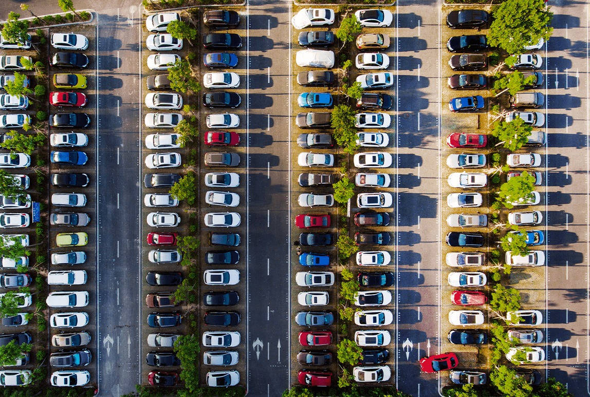 High-angle Shot Of Organized Parking Lot Background
