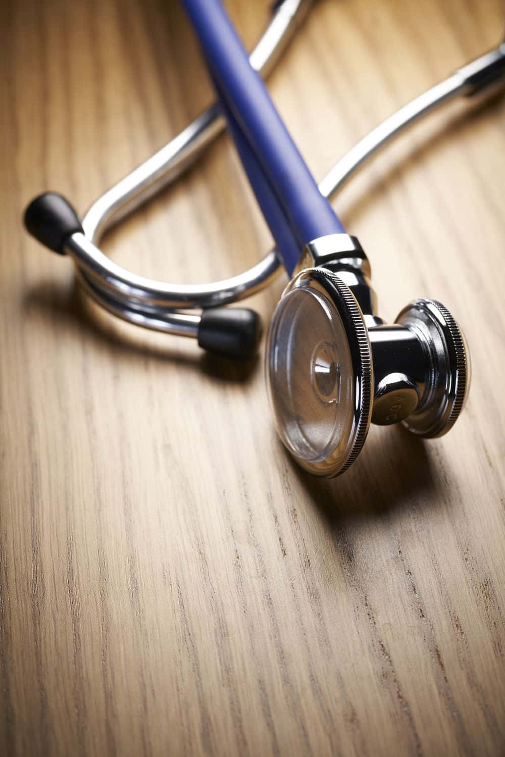 High Definition Image Of A Stethoscope On A Medical Table Background