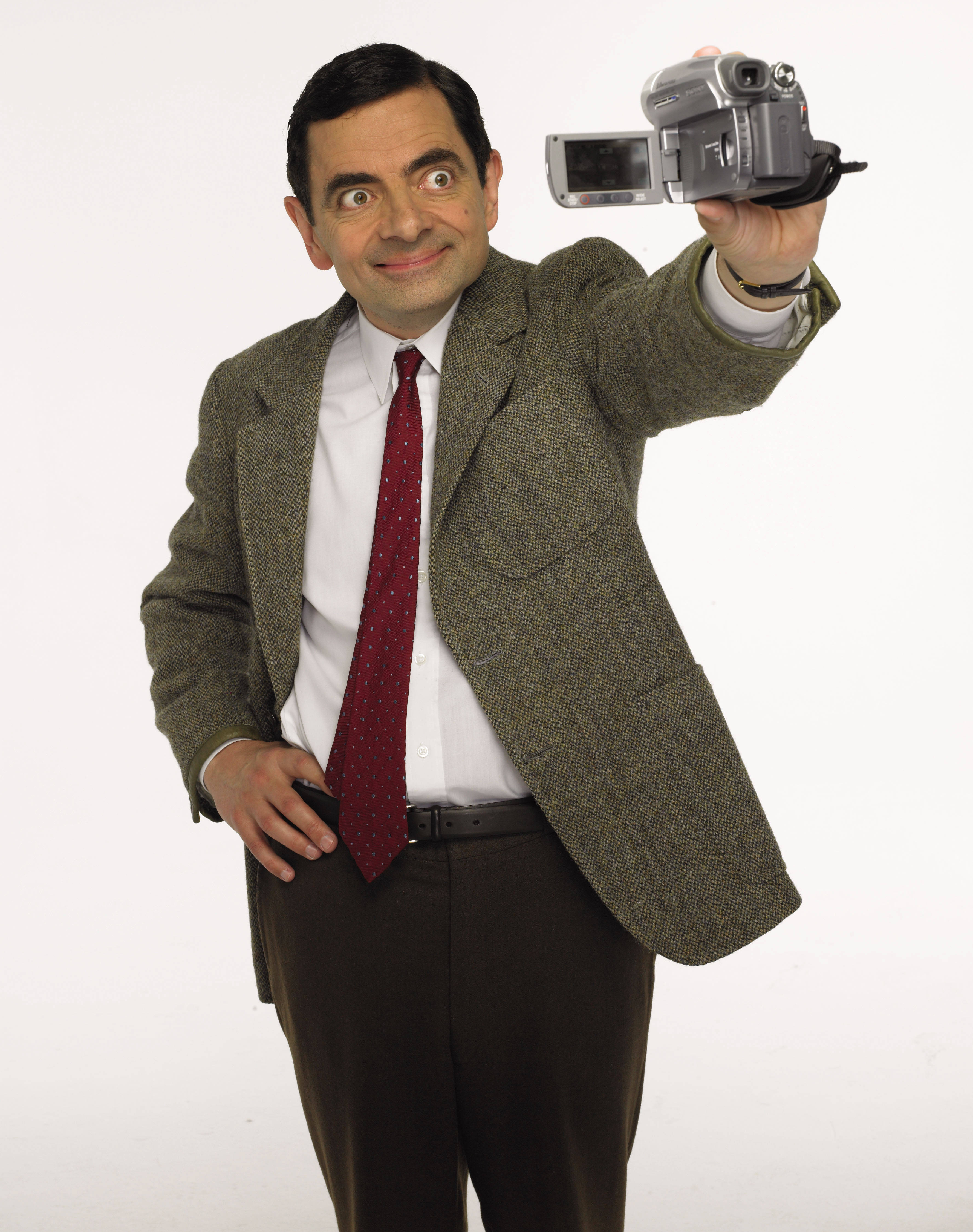 High Definition Image Of Mr. Bean With 4k Video Camera Background