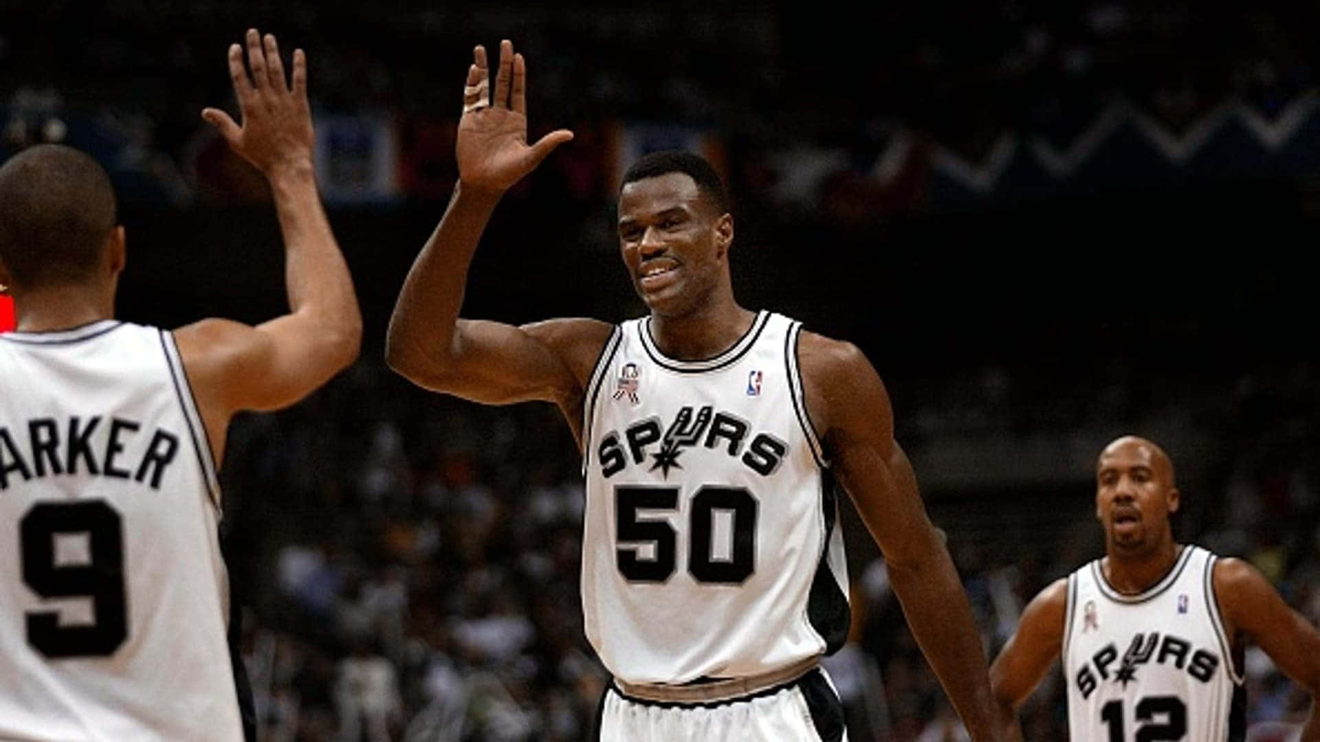 High-five With Nba Star David Robinson Background