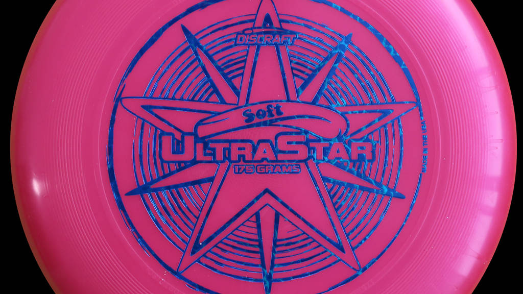 High-flying Pink Ultimate Frisbee Disc Background