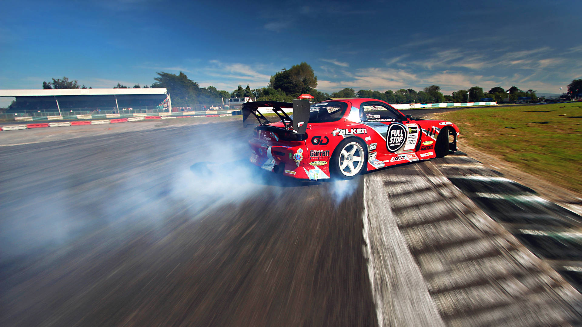 High-speed Mazda Rx-7 Drift Car In Action Background