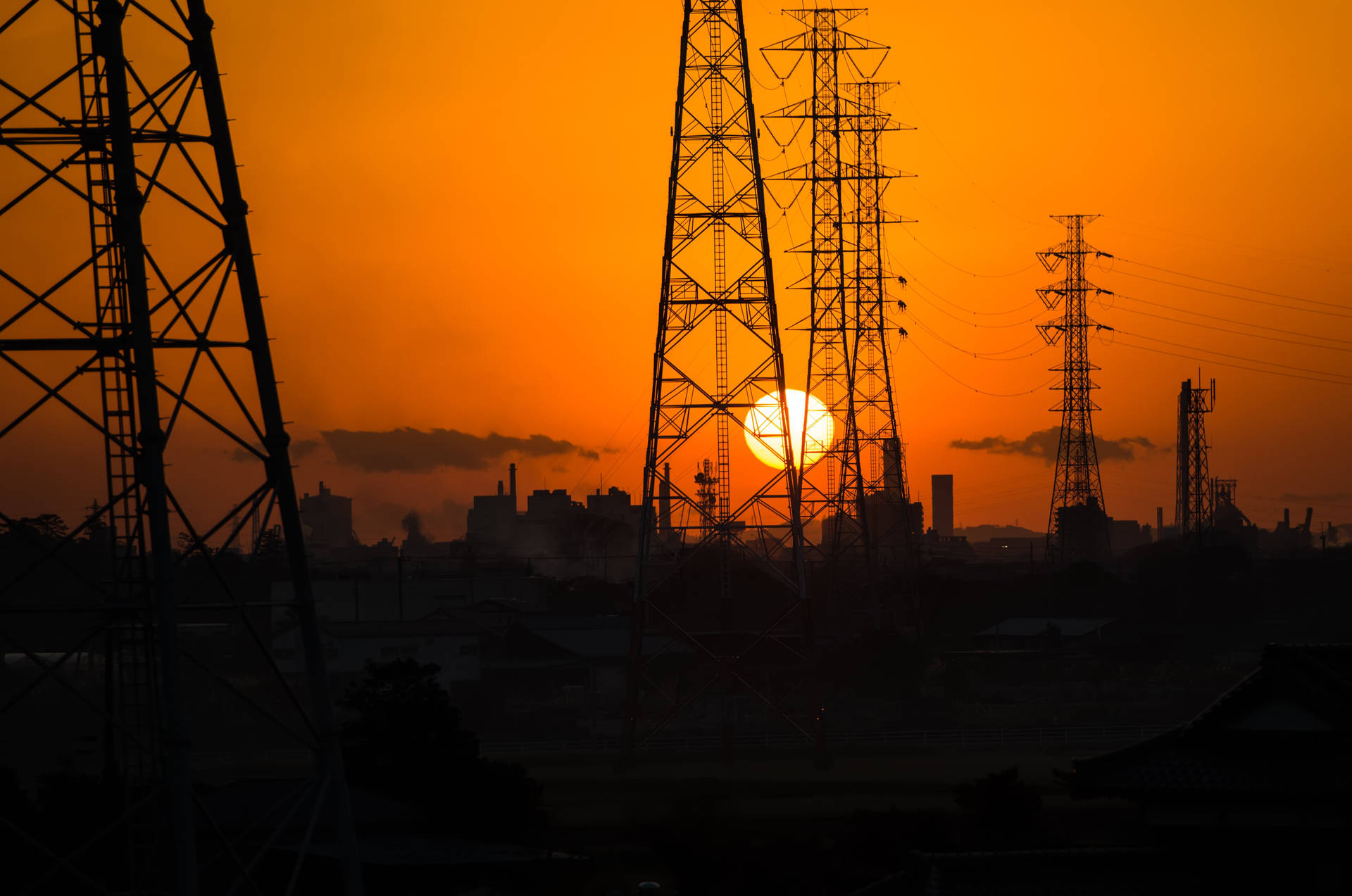 High Voltage Current Power Lines At Sunset Background