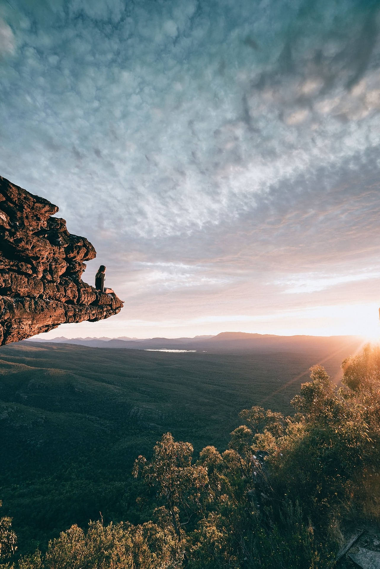 Hiking On Cliff Background