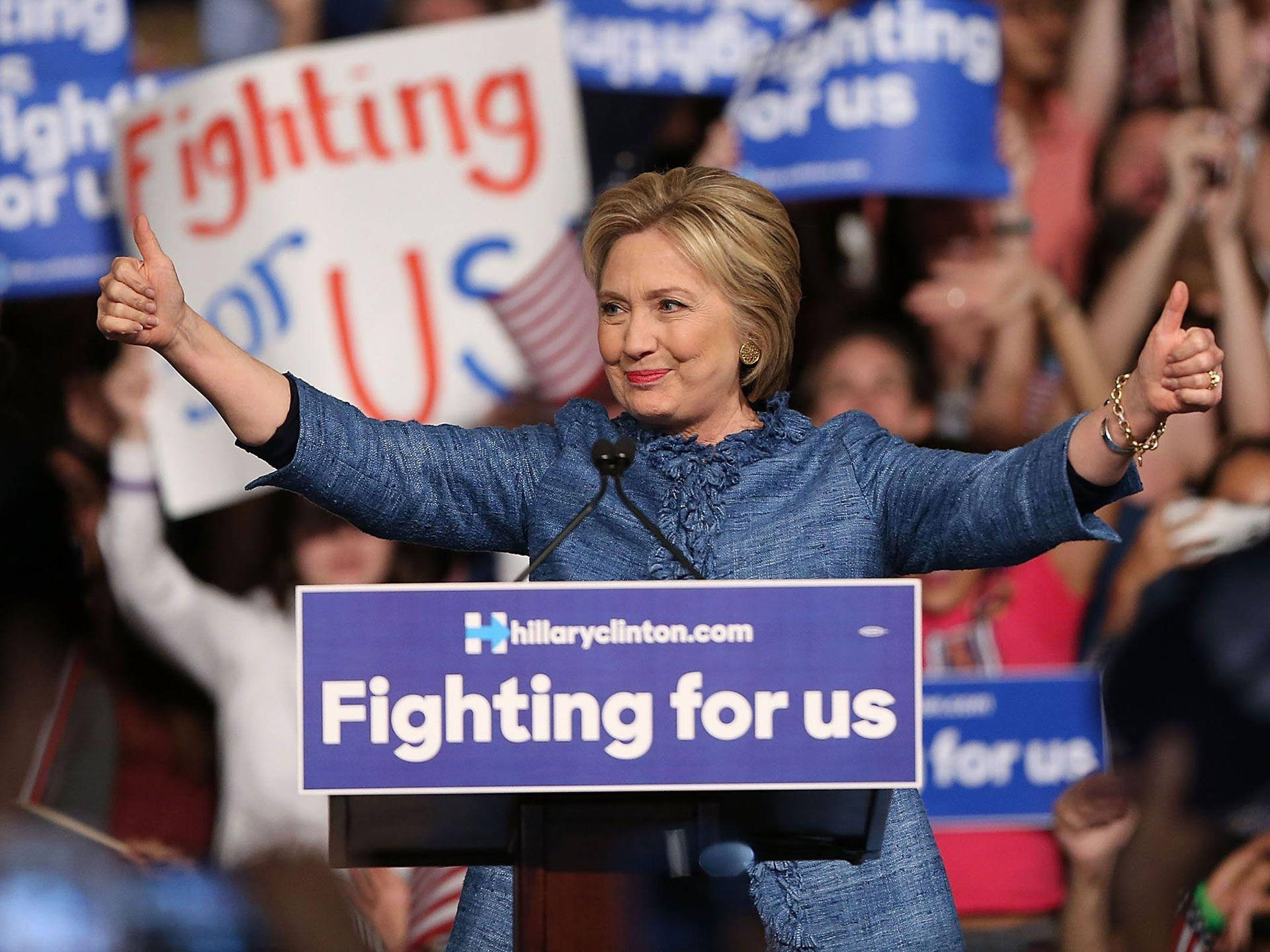 Hillary Clinton Giving A Thumbs Up Background