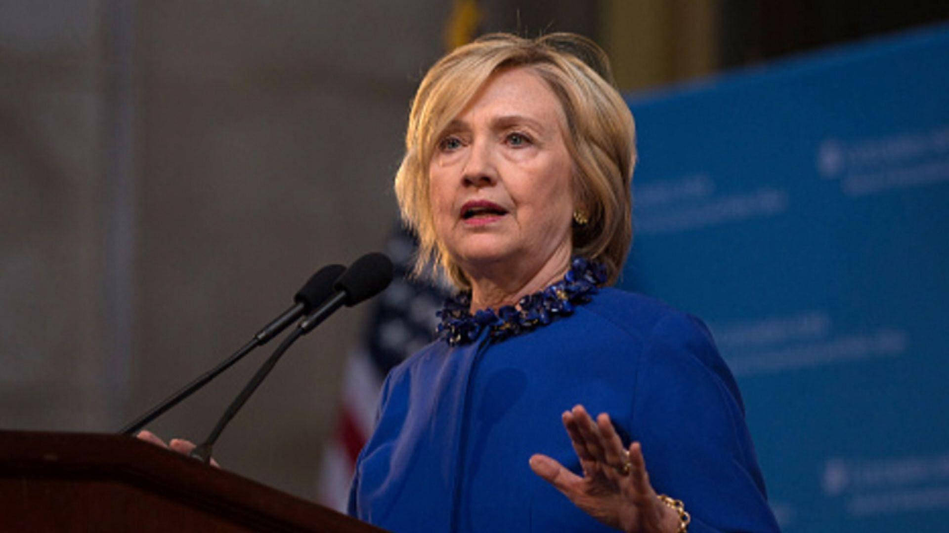 Hillary Clinton With A Serious Expression Background