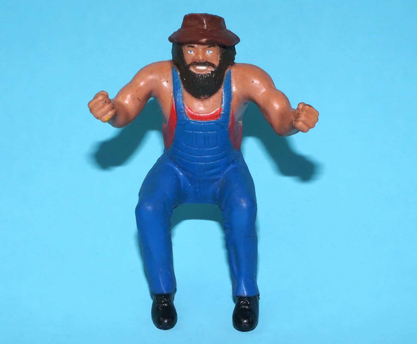 Hillbilly Jim Wrestling Figure Blue Background Background