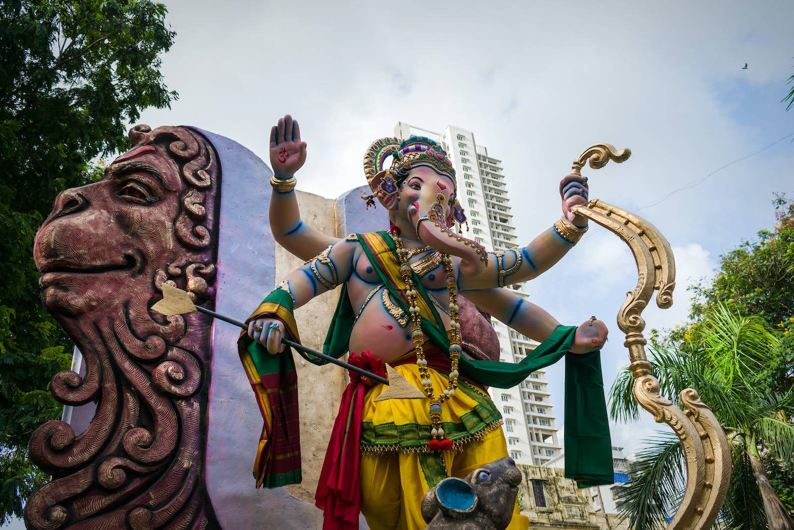 Hindu God Ganesh Under The Sky Background