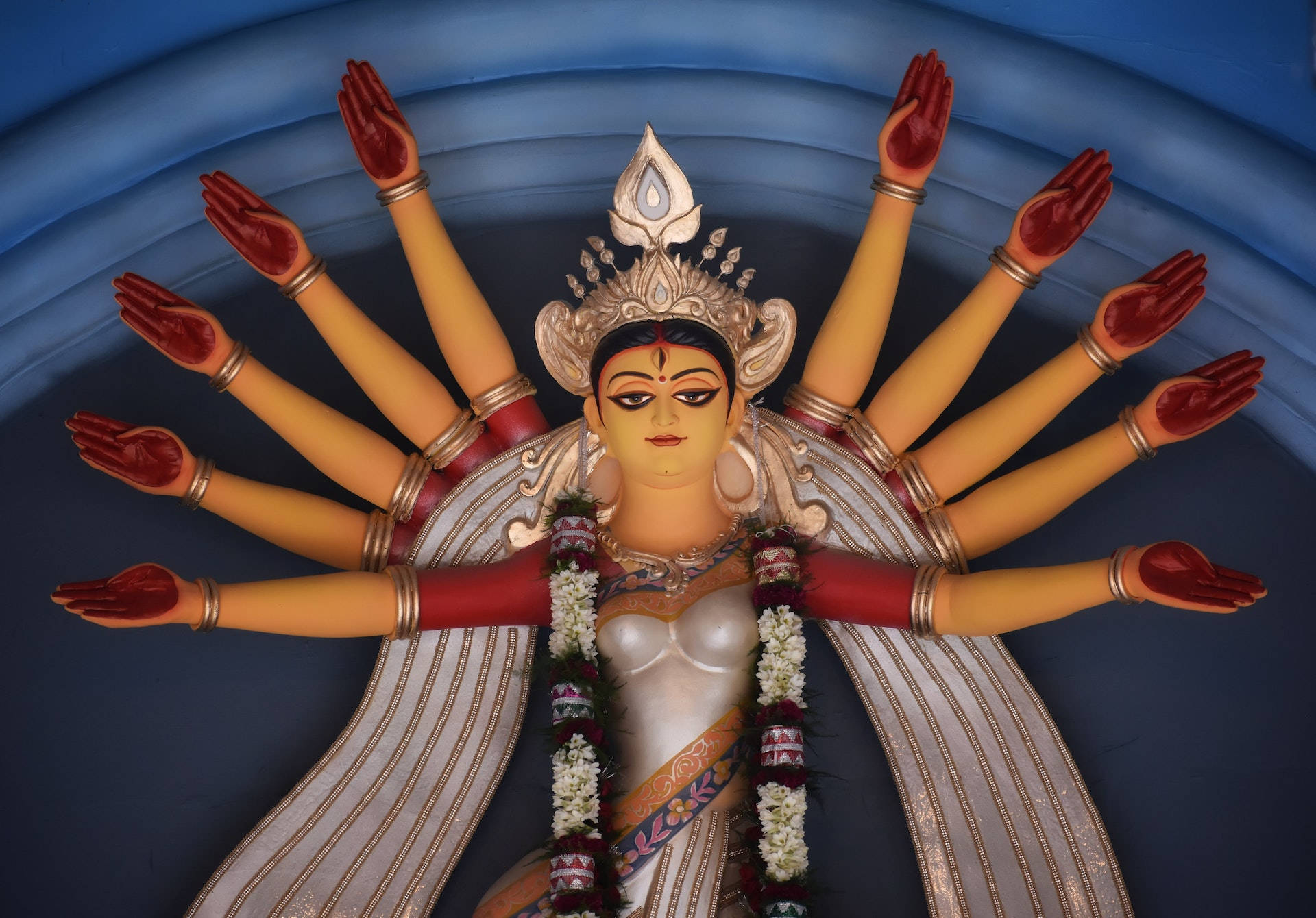 Hindu Goddess Durga With Red Hands Background