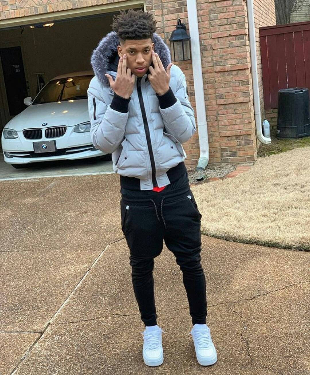 Hip-hop Artist Nle Choppa Posing For A Candid Shot Background