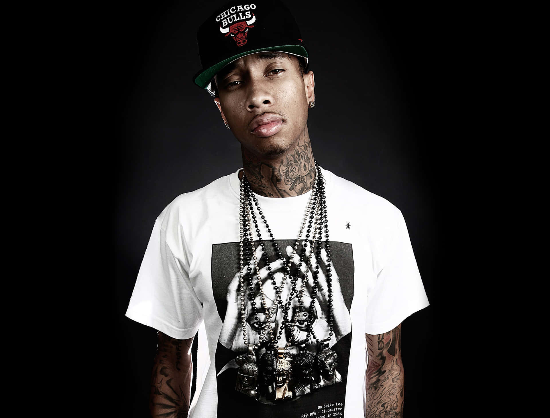 Hip Hop Artist Tyga Shows Off A Variety Of Tattoos Background