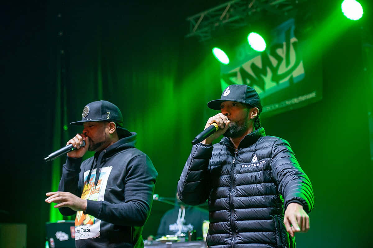 Hip Hop Duo Performing Liveon Stage Background