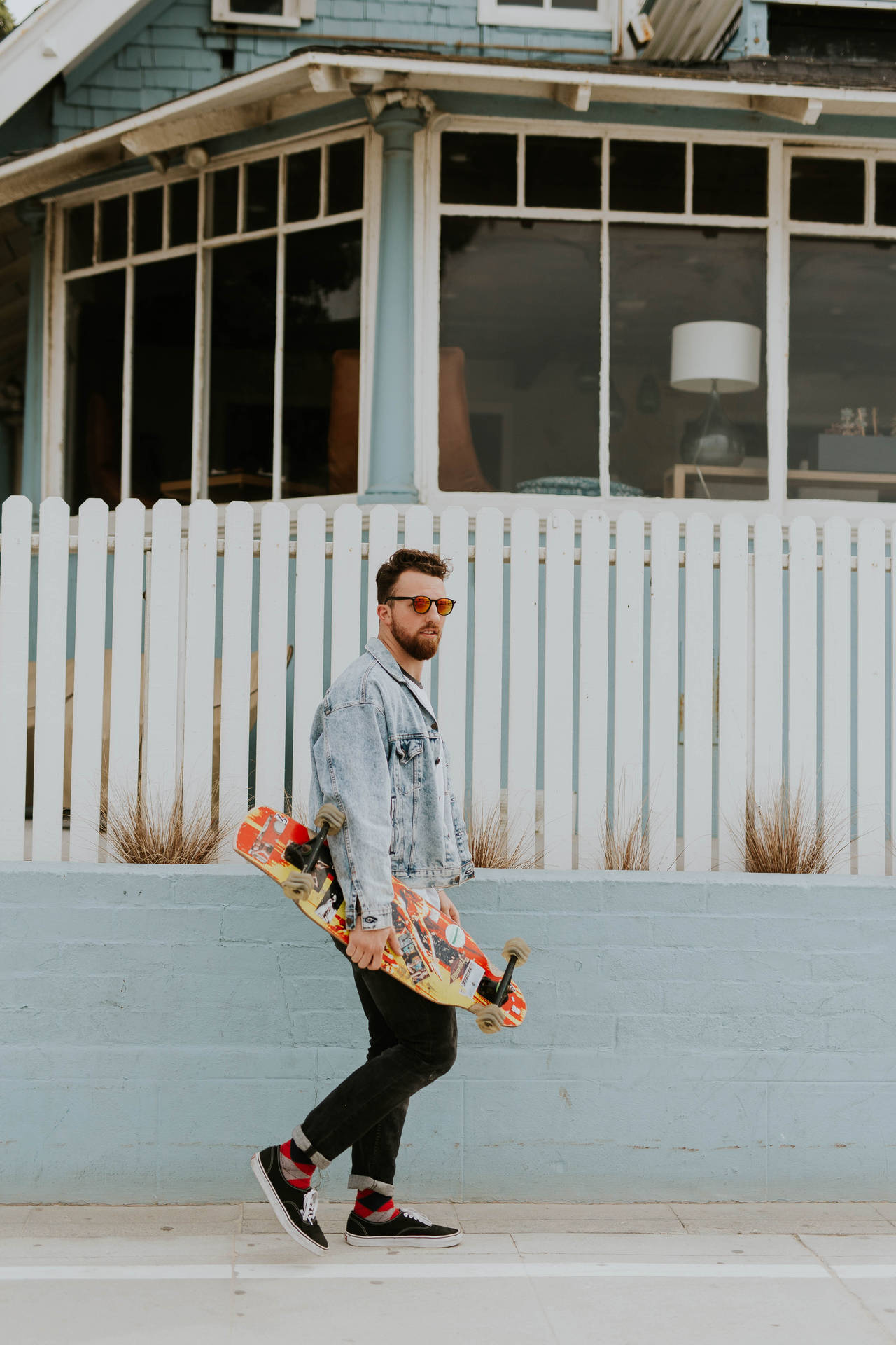 Hipster With Longboard Background
