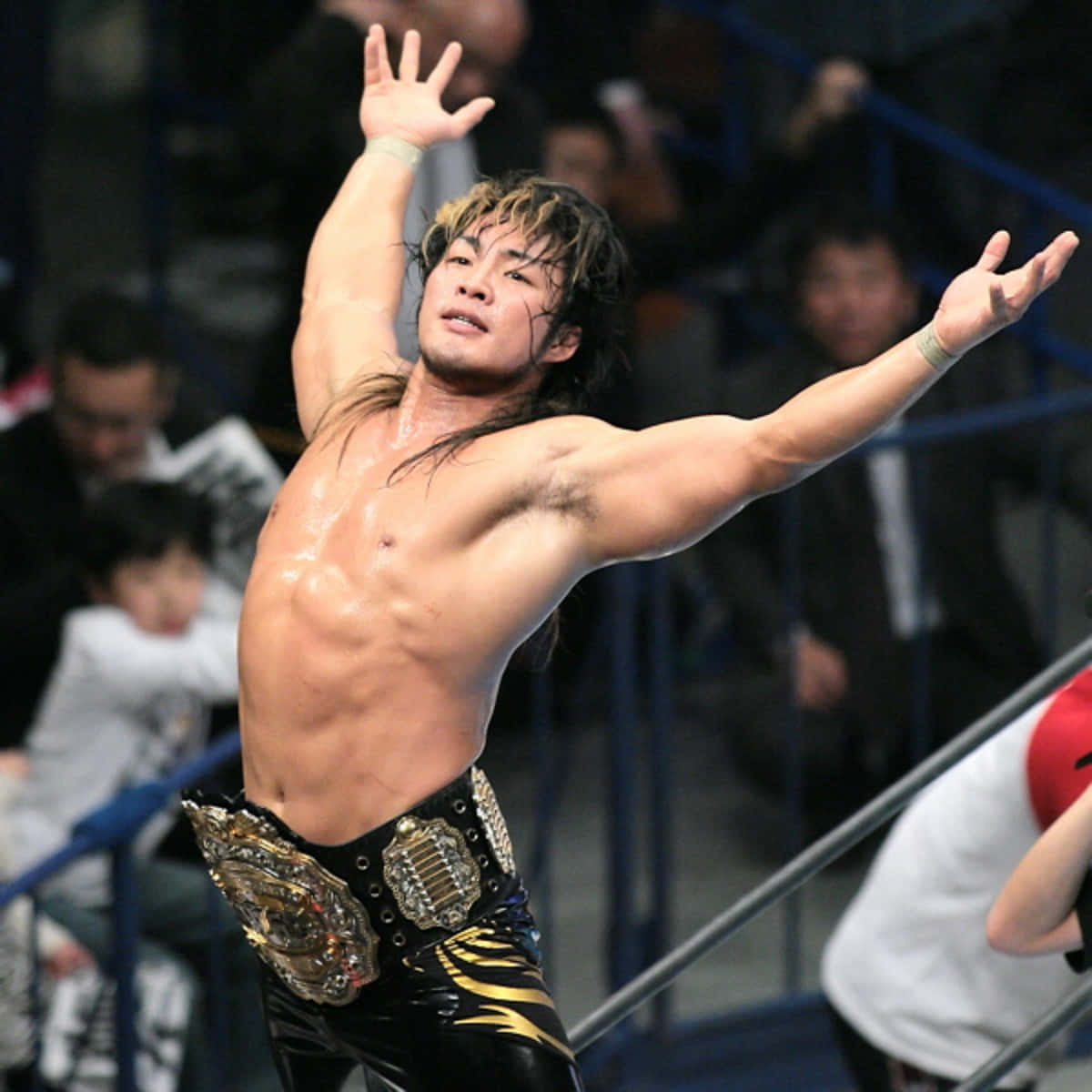 Hiroshi Tanahashi Holding His Njpw Heavyweight Championship Belt. Background