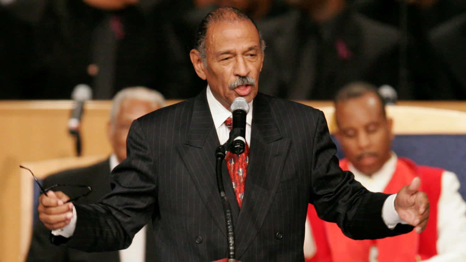 Historic Photograph Of John Conyers At A Political Rally. Background
