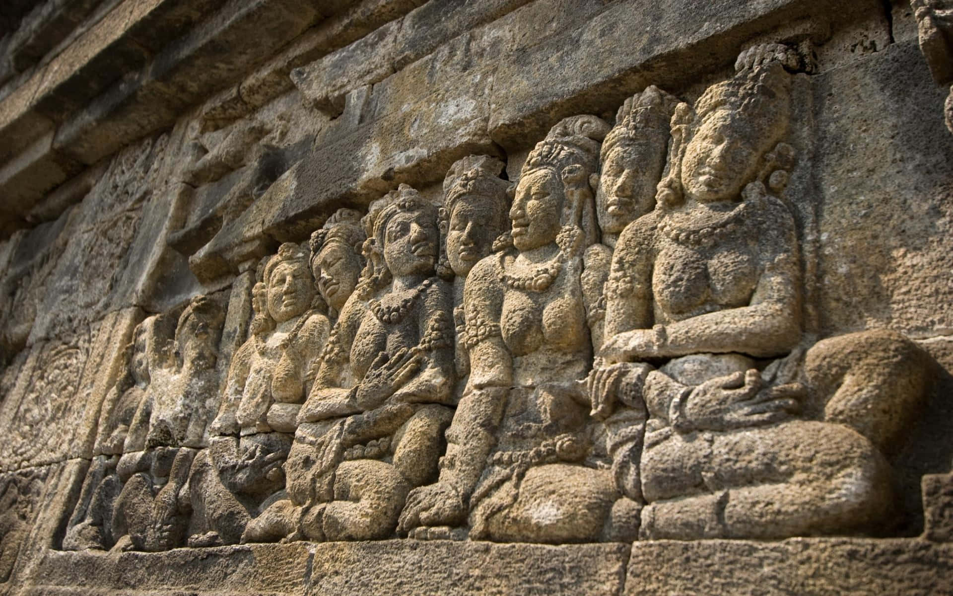 Historic Sculptures In Borobudur Temple Background